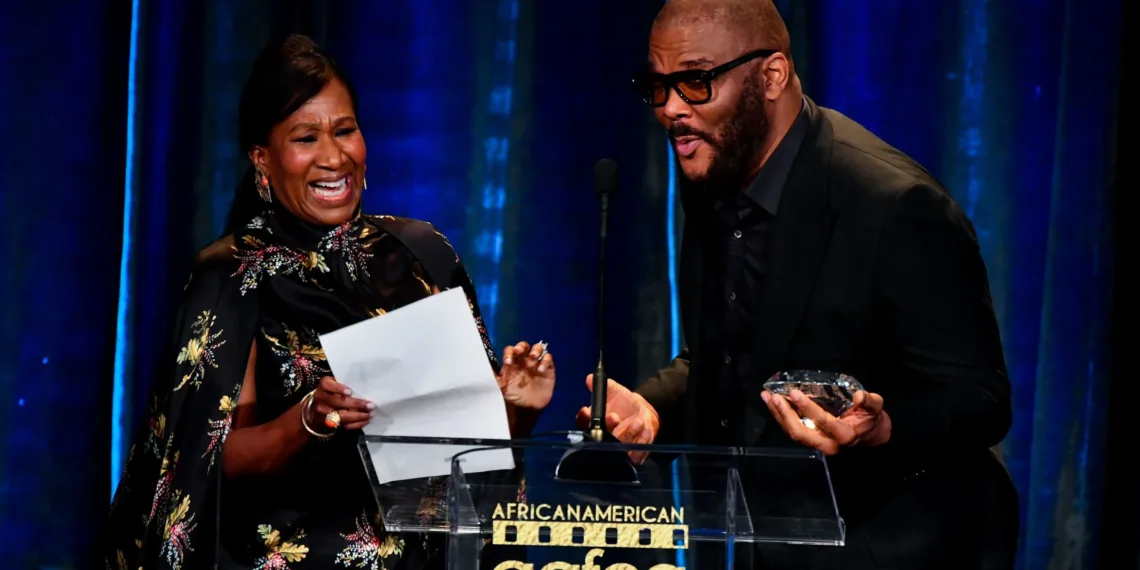 Tyler Perry Presents Nicole Avant with Beacon Award at AAFCA Awards 41 Tyler Perry